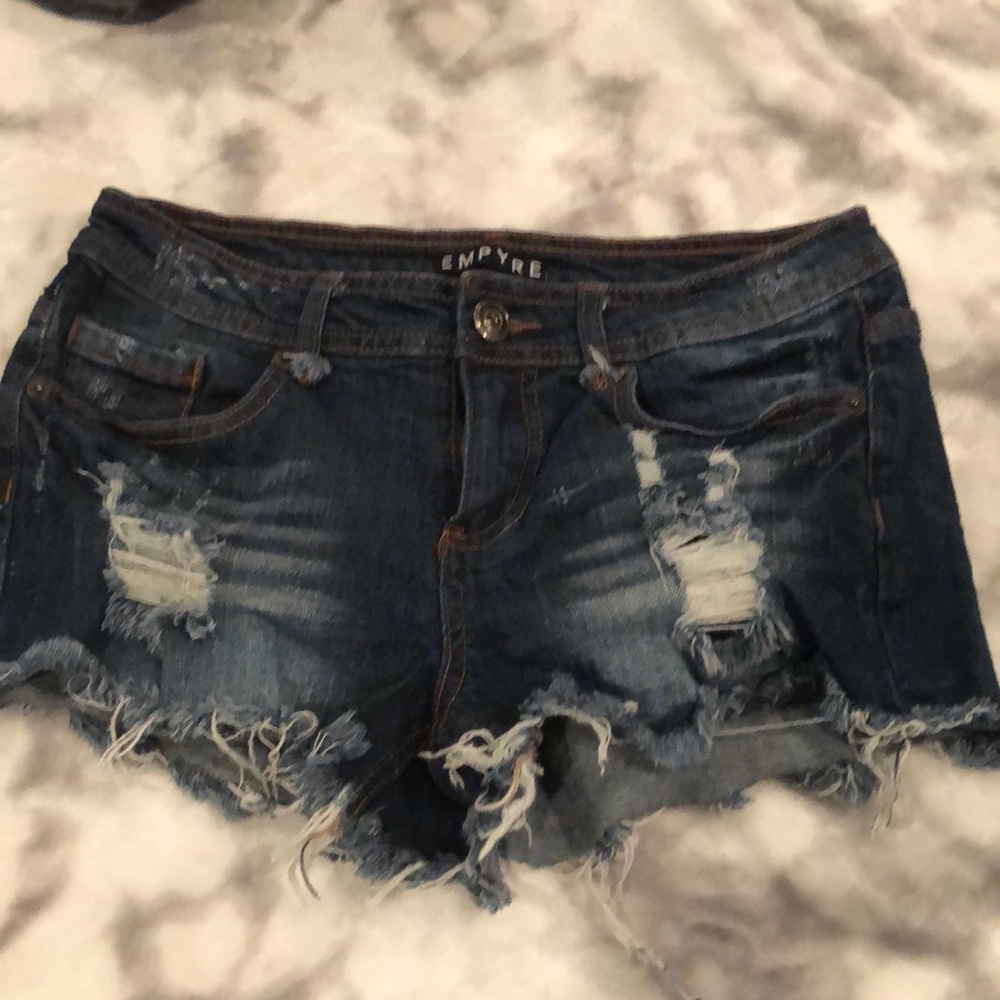 Distressed jean cut offs